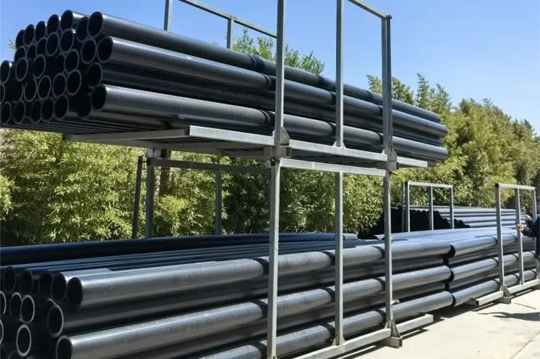 HDPE plastic pipes on a rack